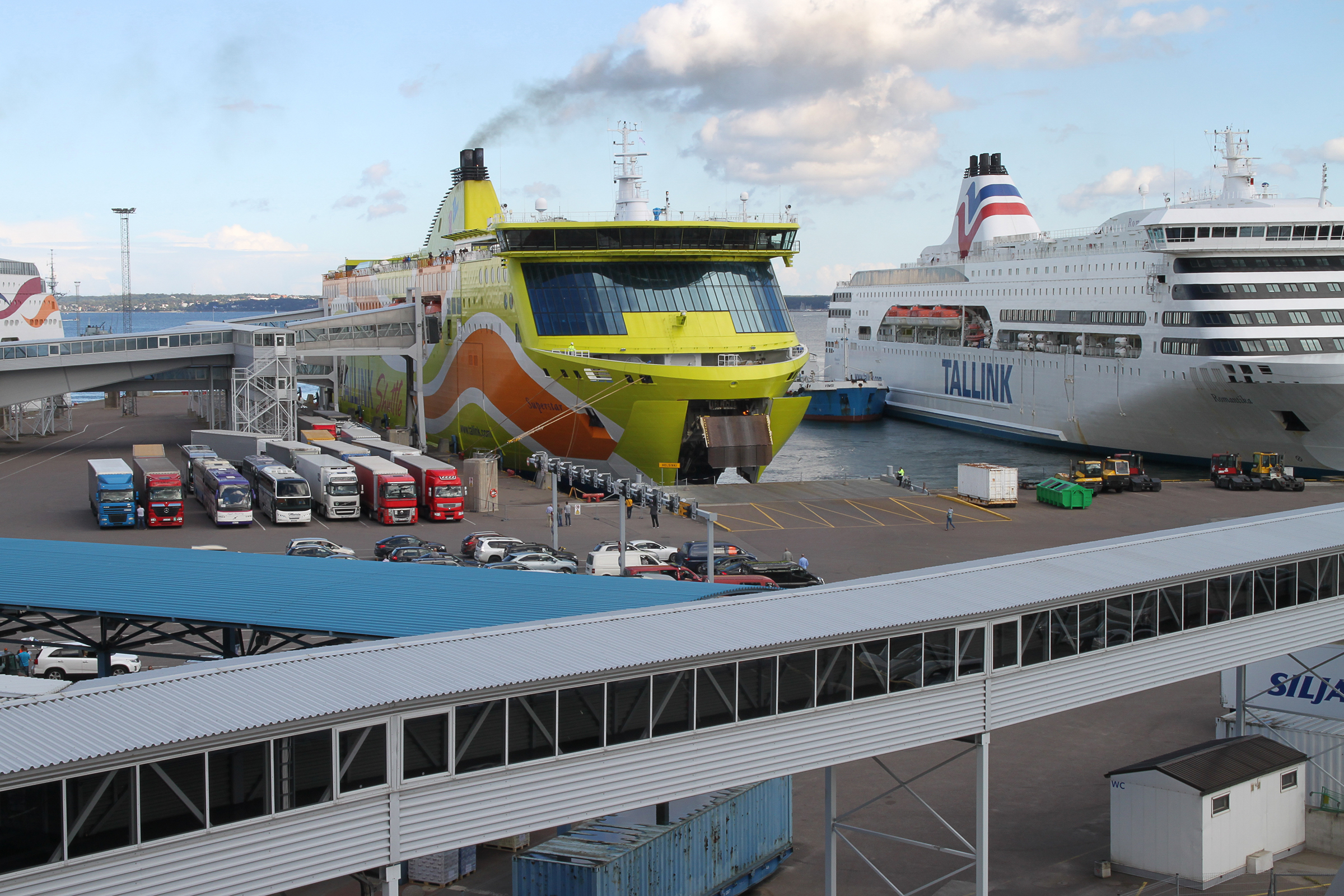 Corridor 1. E12, E18, E20, E67, E75, E263, E265 Tallinn, Estonia: vehicles waiting for embarkation for the ferry link between the twin cities of Tallinn and Helsinki. Each harbor represents a funnel or bottleneck of several road corridors narrowing down to a single ferry line, with the rhythms of the ships strongly affecting both towns.